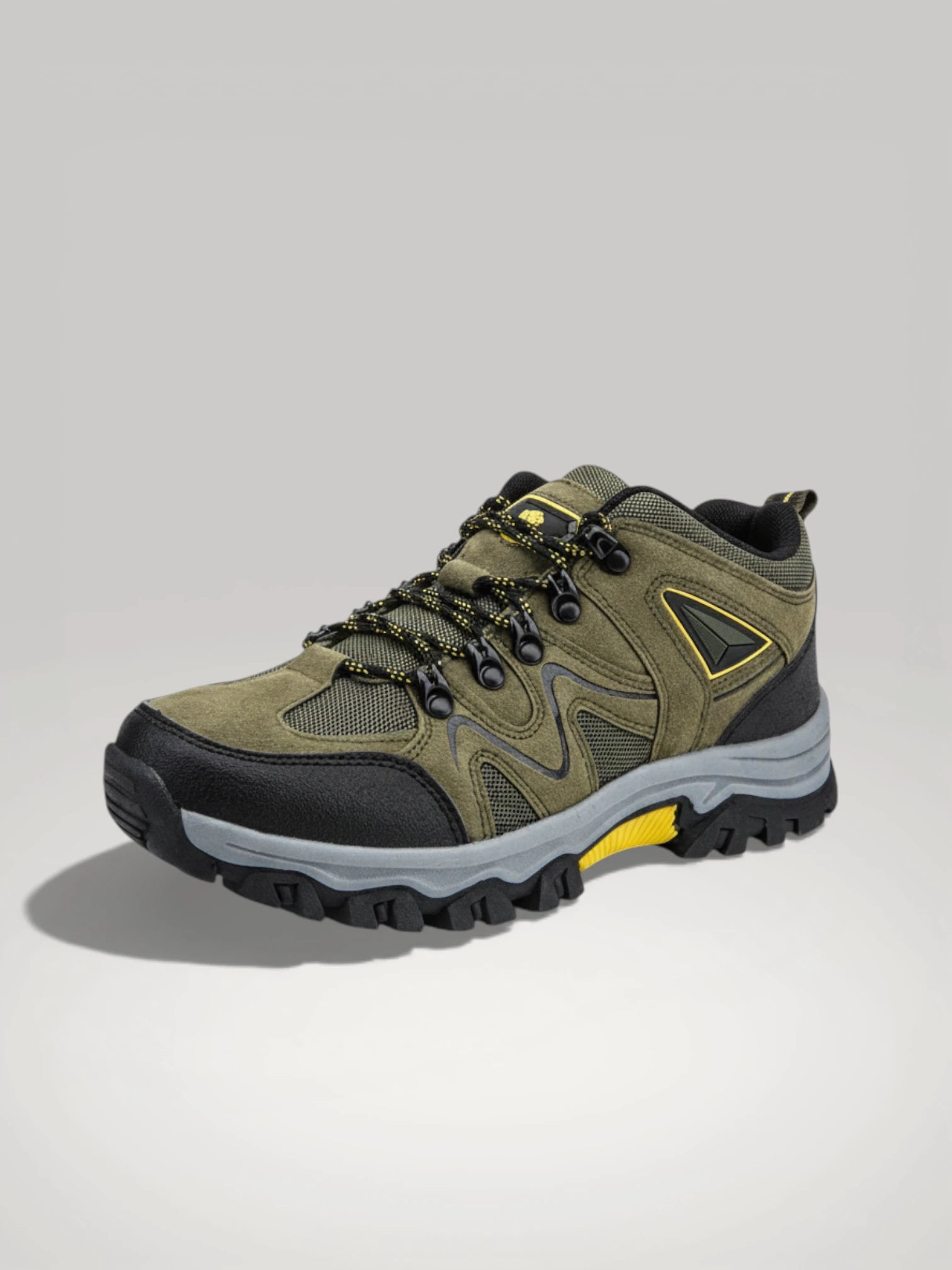Vue latérale de la chaussure Explorateur Pro : semelle ergonomique amortissante et finition en daim de haute qualité pour homme et femme.