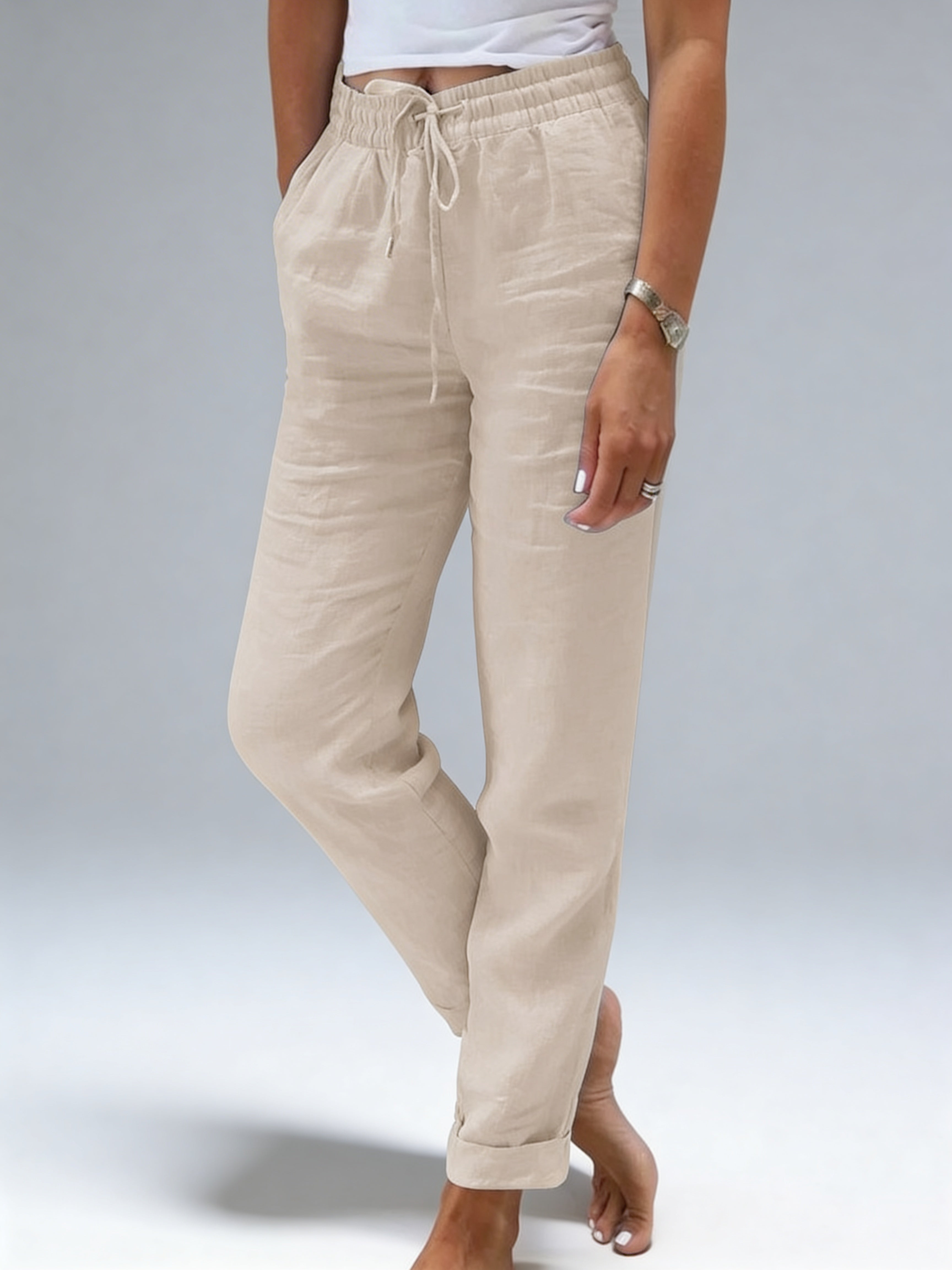 Pantalon décontracté Beige Pierre pour femme, taille élastiquée avec cordon ajustable.