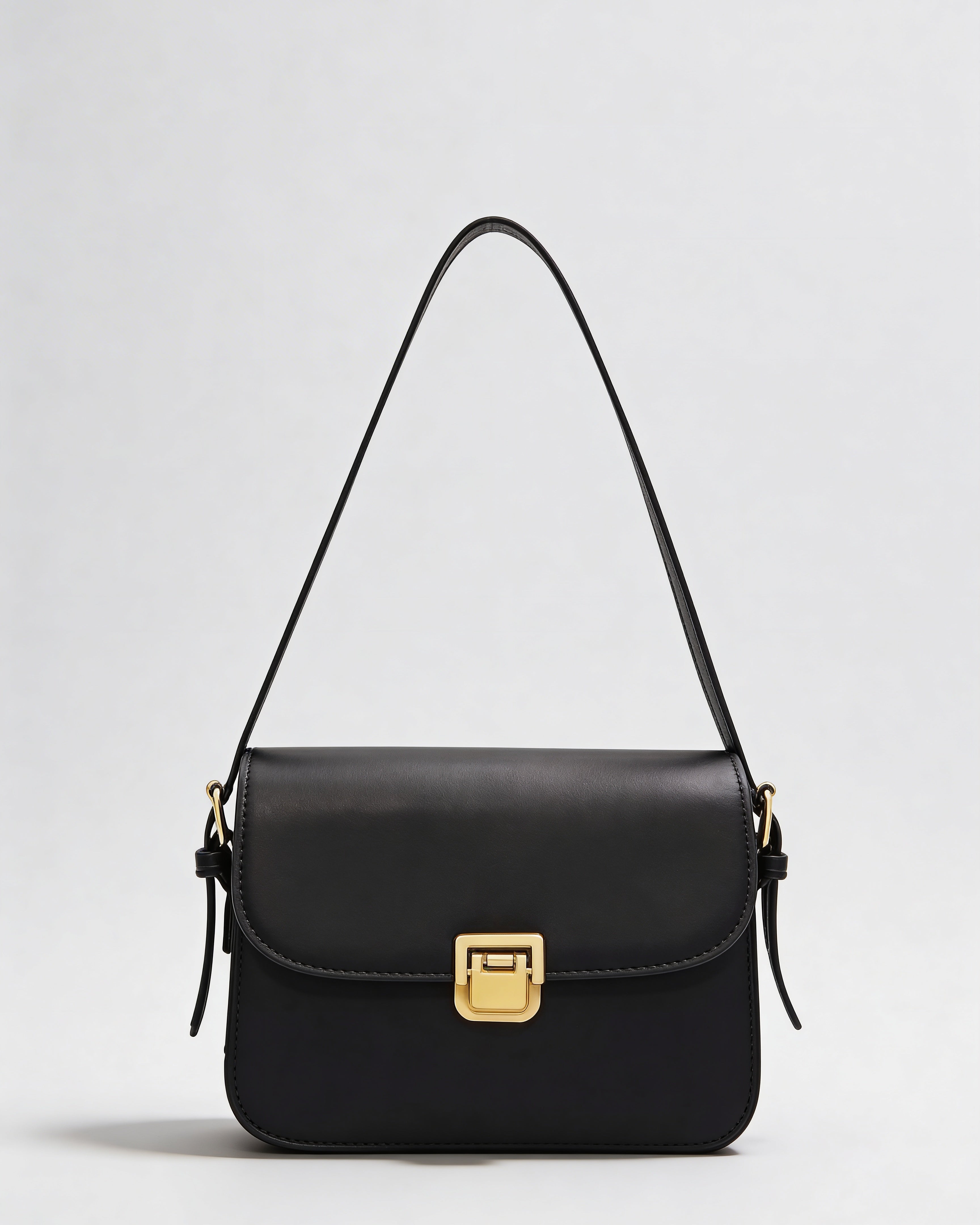 Petit sac bandoulière couleur brun expresso pour femme, design structuré.