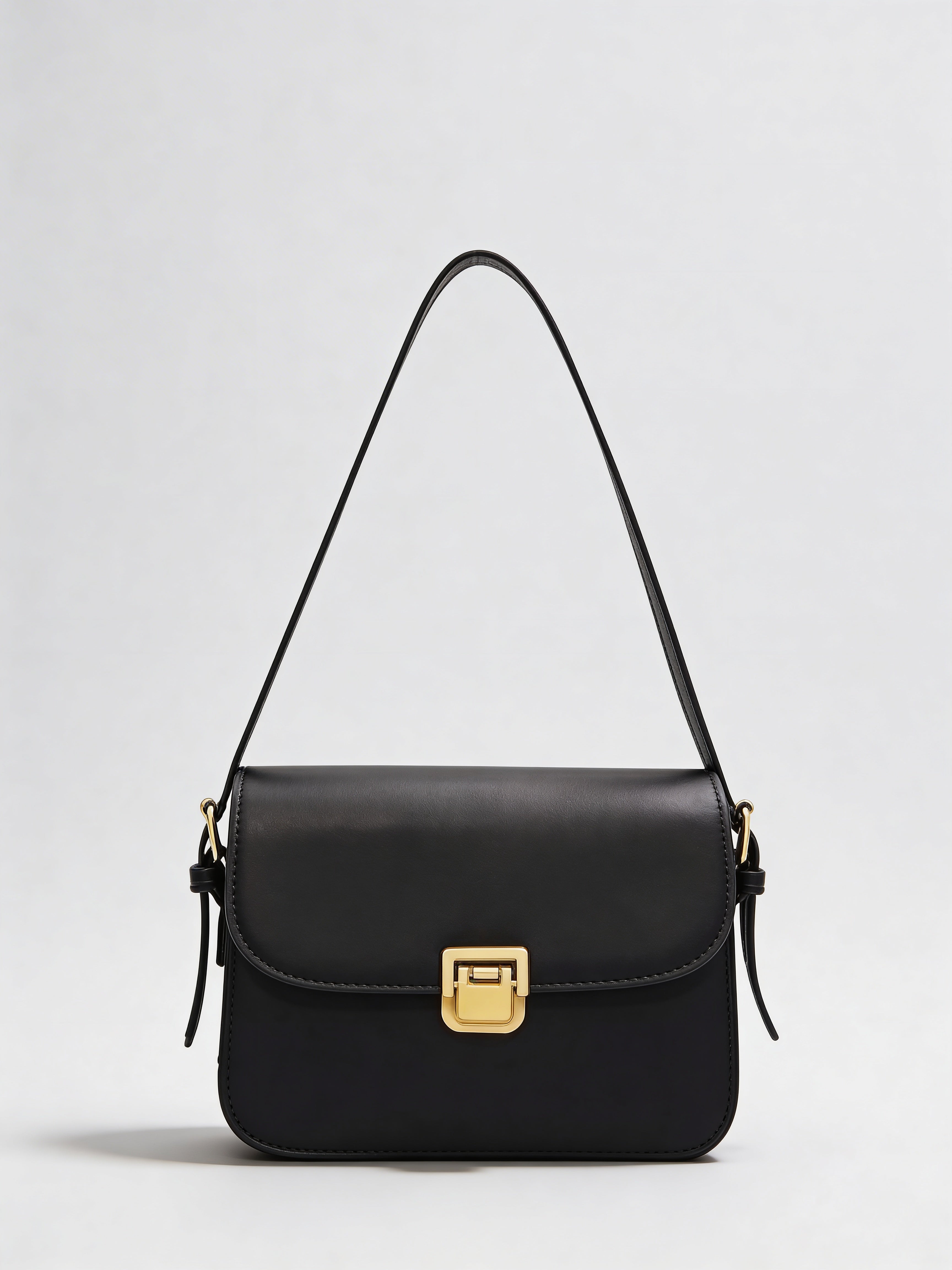 Petit sac bandoulière couleur brun expresso pour femme, design structuré.