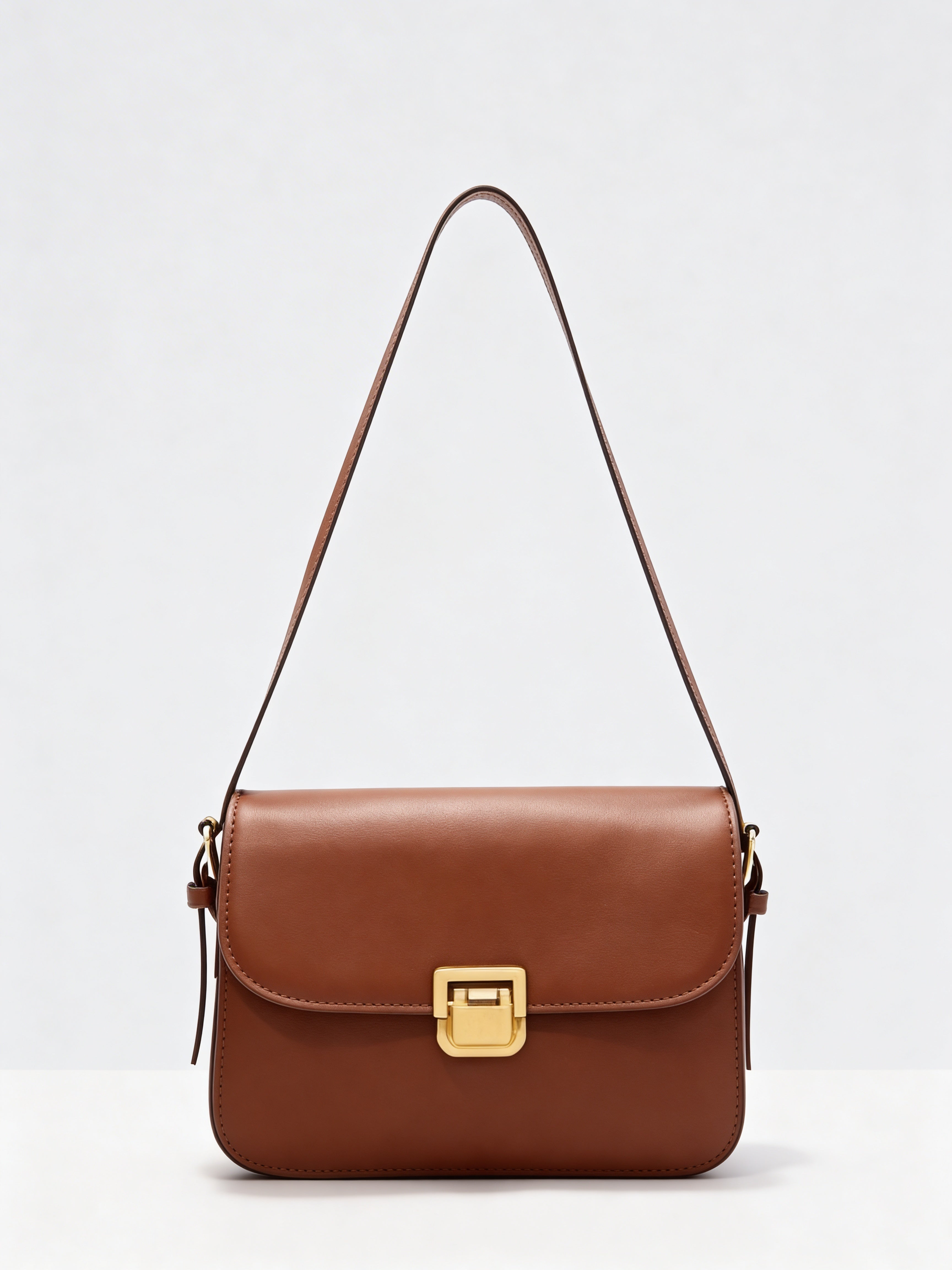 Sac besace couleur caramel épicé avec bandoulière ajustable Urbain Couture.