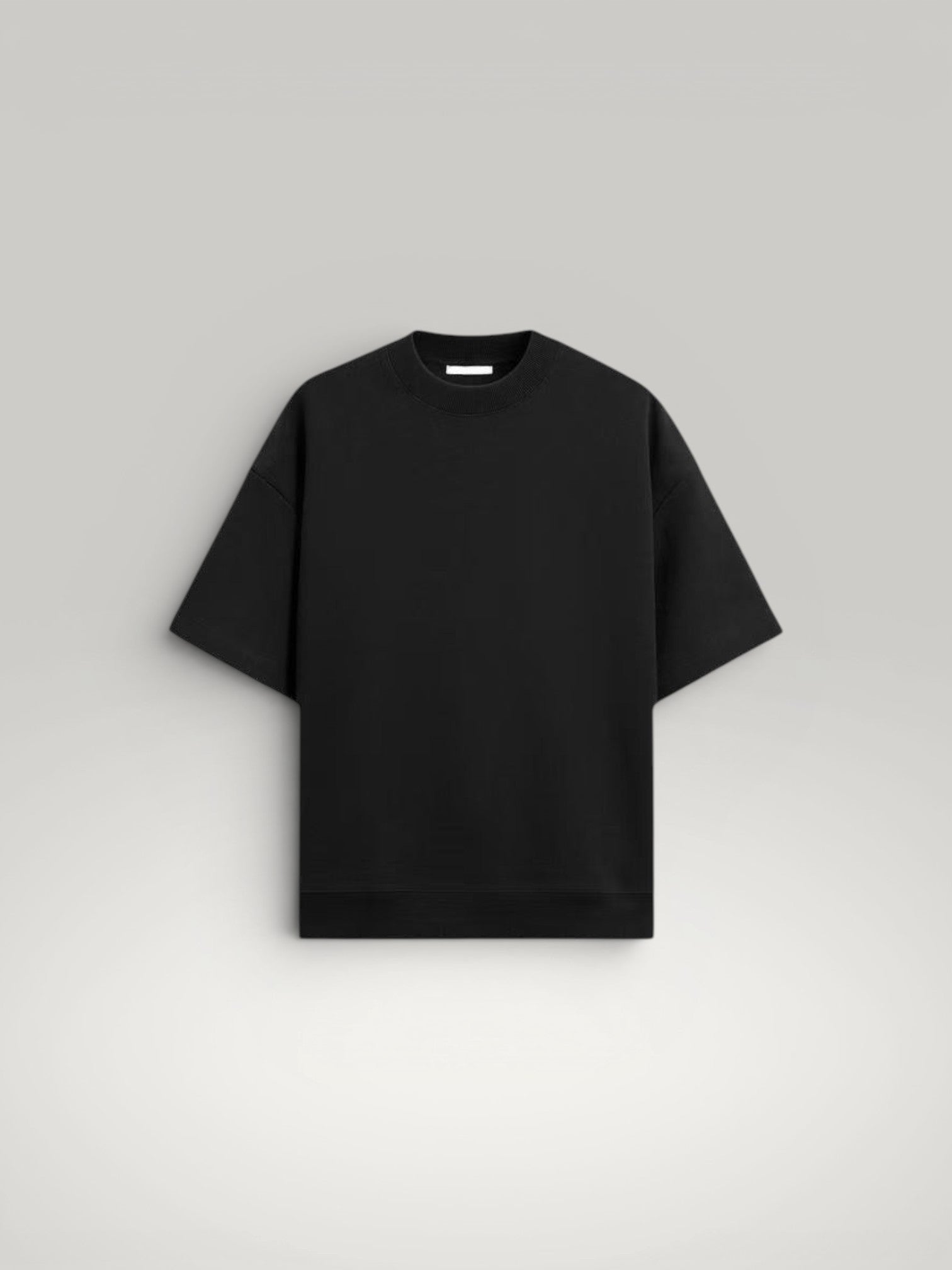 Urbain Couture black oversized t-shirt with textured double-face fabric and wide sleeves.