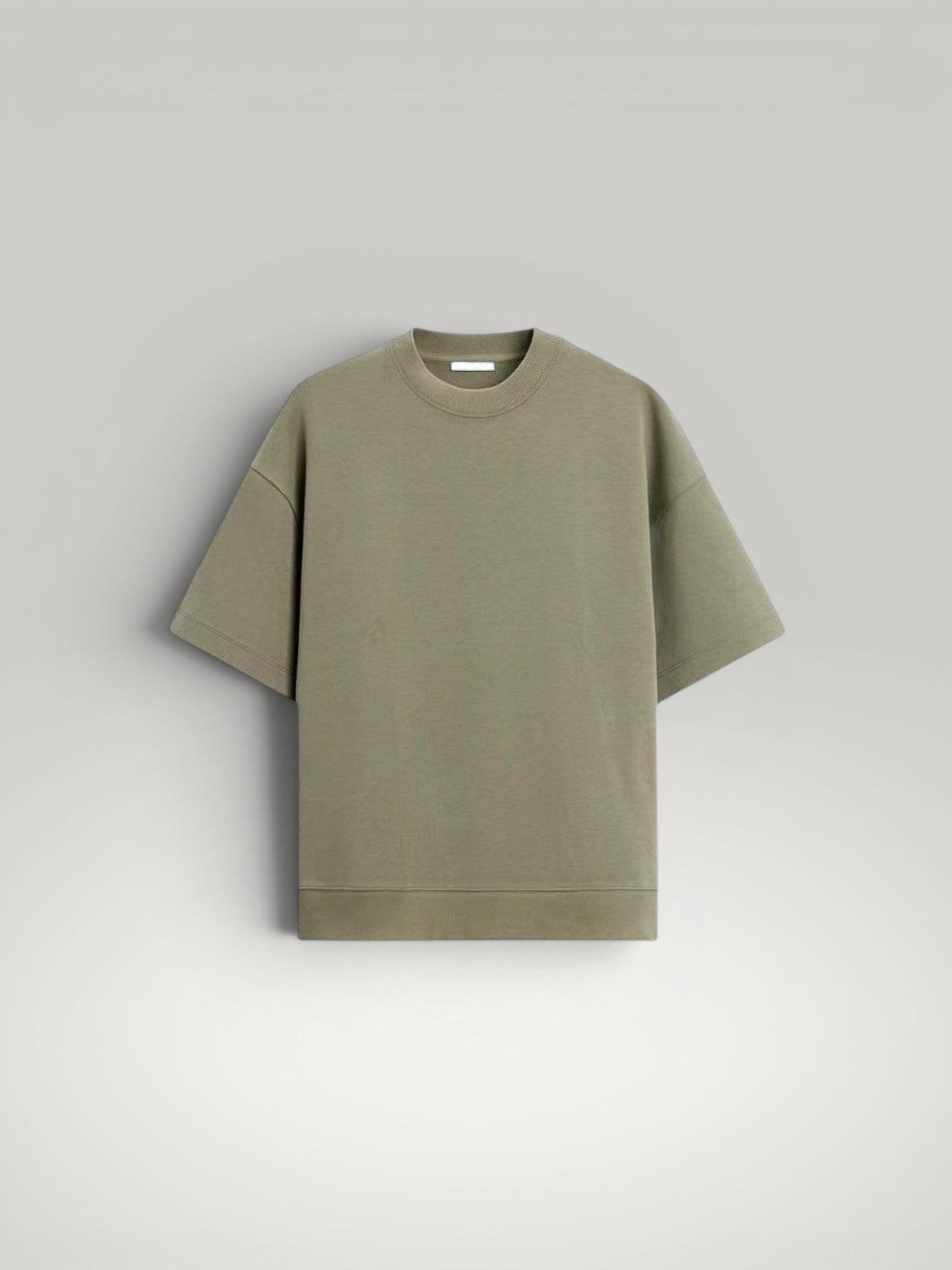 Urbain Couture olive green oversized t-shirt with wide short sleeves and textured double-face fabric.