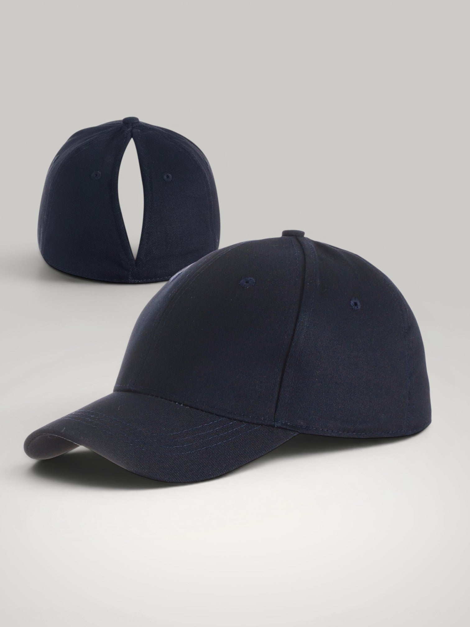 Urbain Couture marineblauwe katoenen paardenstaart cap met magnetische sluiting, ideaal voor sport en vrije tijd.