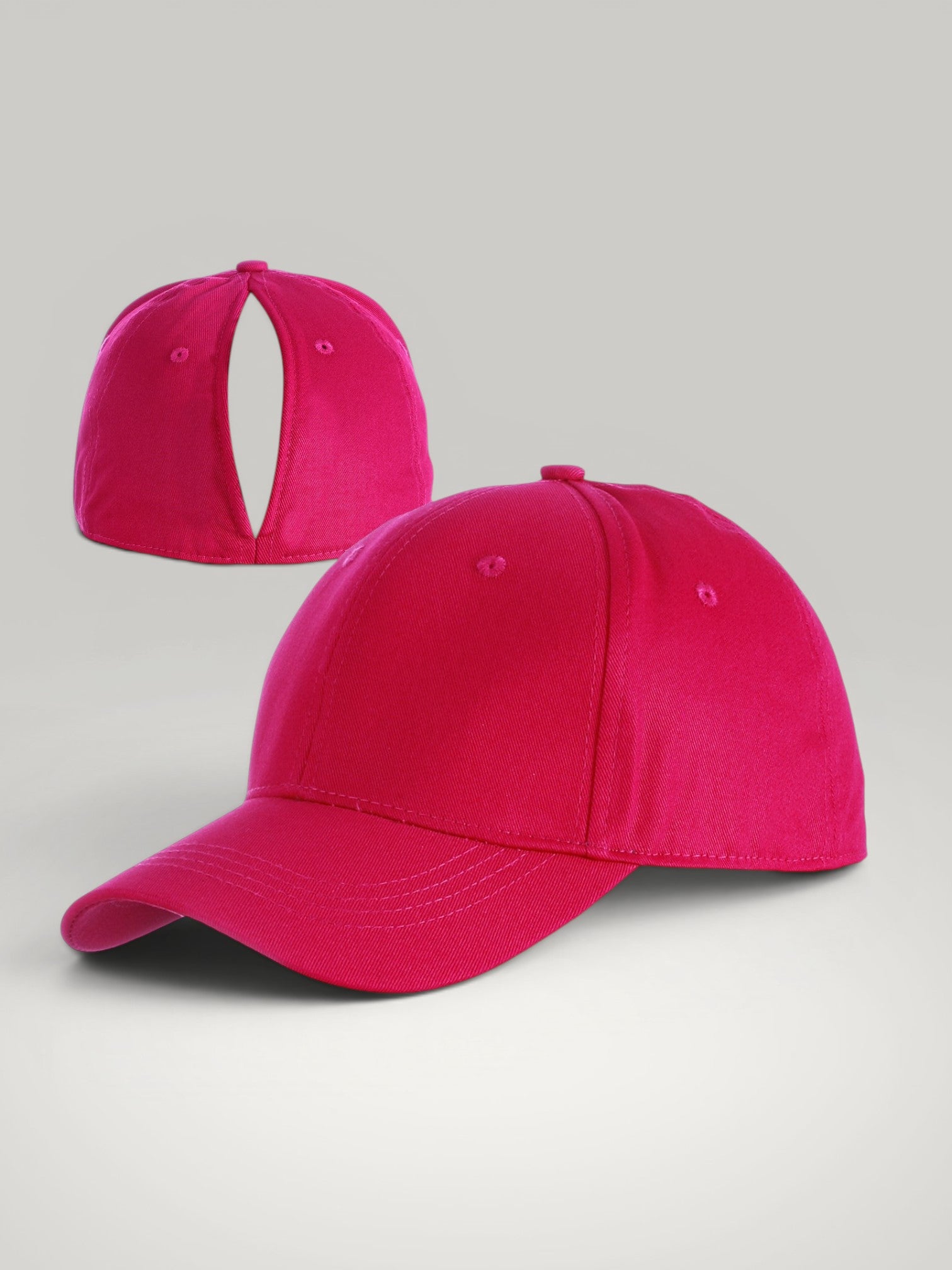 Urbain Couture roze katoenen paardenstaart pet met magnetische sluiting en open achterkant voor haarstijlen.
