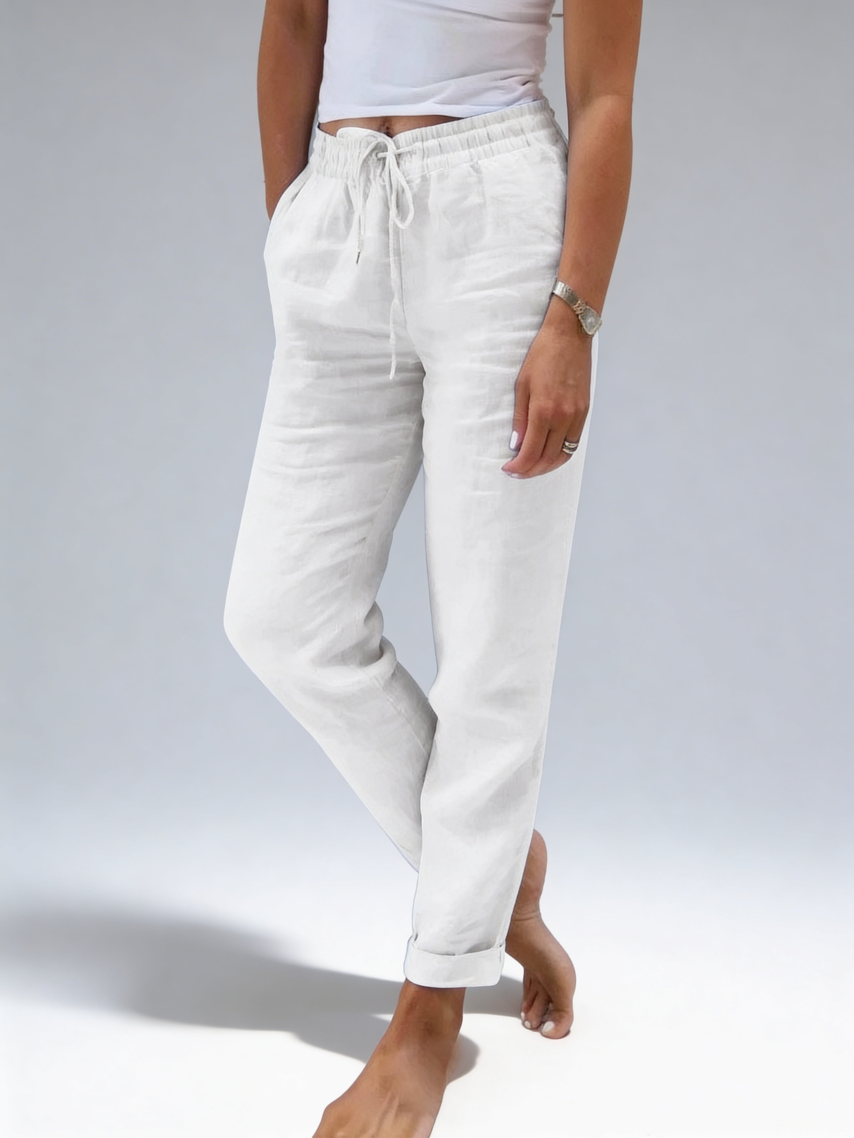 Pantalon d'été fluide Blanc Cassé pour femme, style bohème chic élégant.