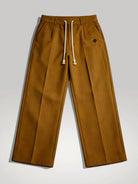 Vue de face pantalon fluide homme kaki avec cordon de serrage blanc et taille élastique - Style décontracté