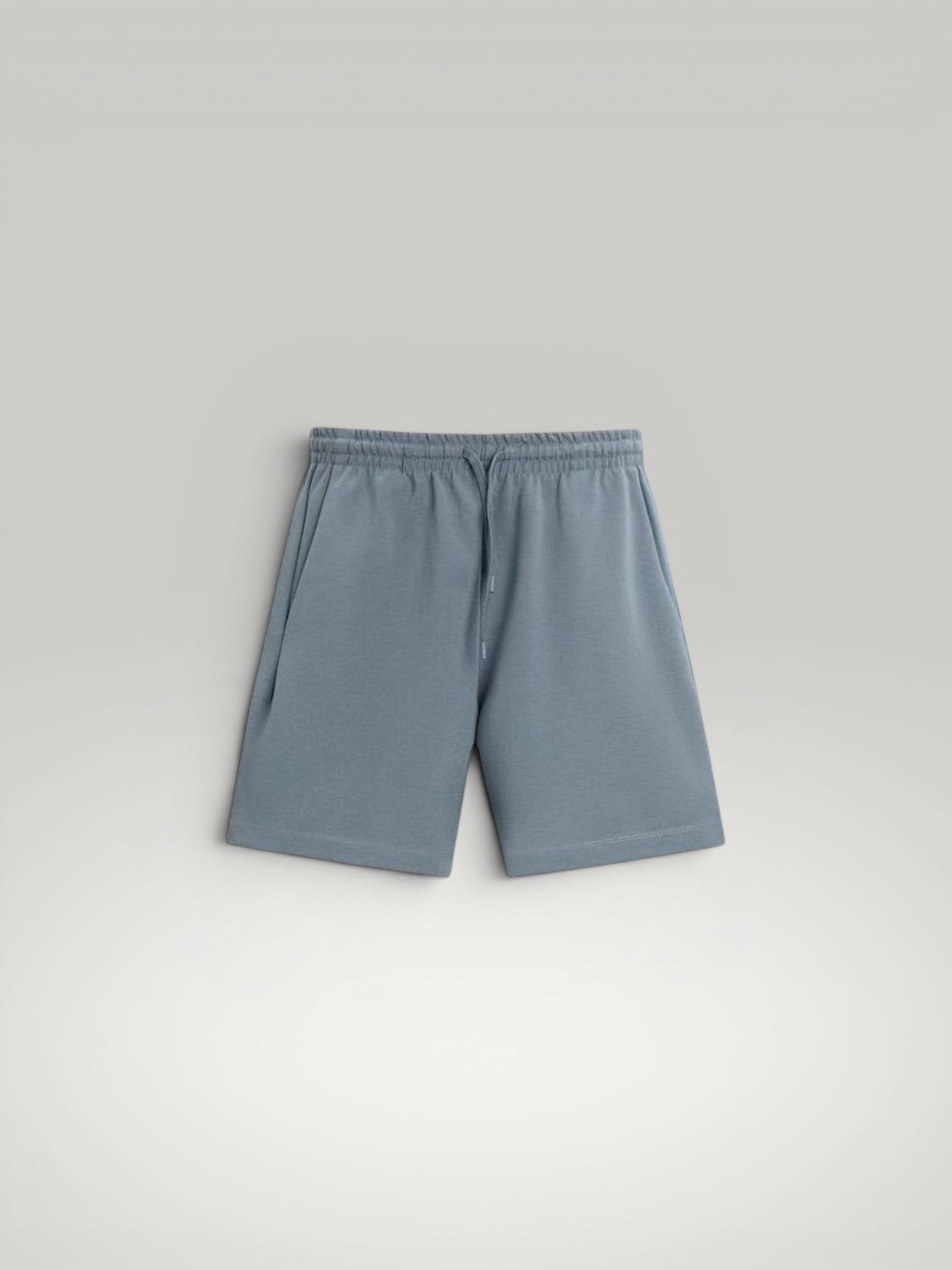 Urbain Couture blue textured double-face cotton blend oversized shorts with drawstring waist.