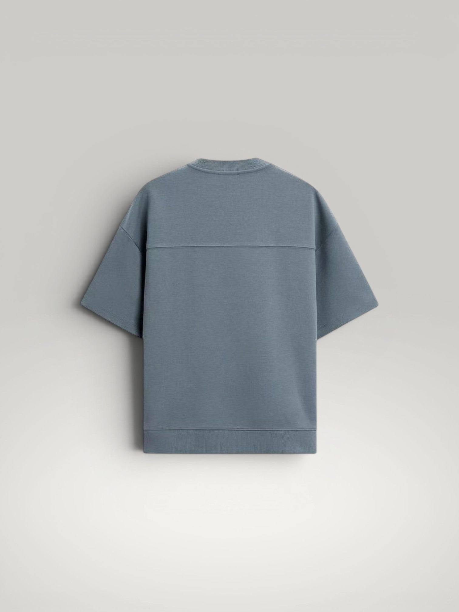 Urbain Couture blue textured double-face fabric oversized t-shirt with wide sleeves and ribbed hem.