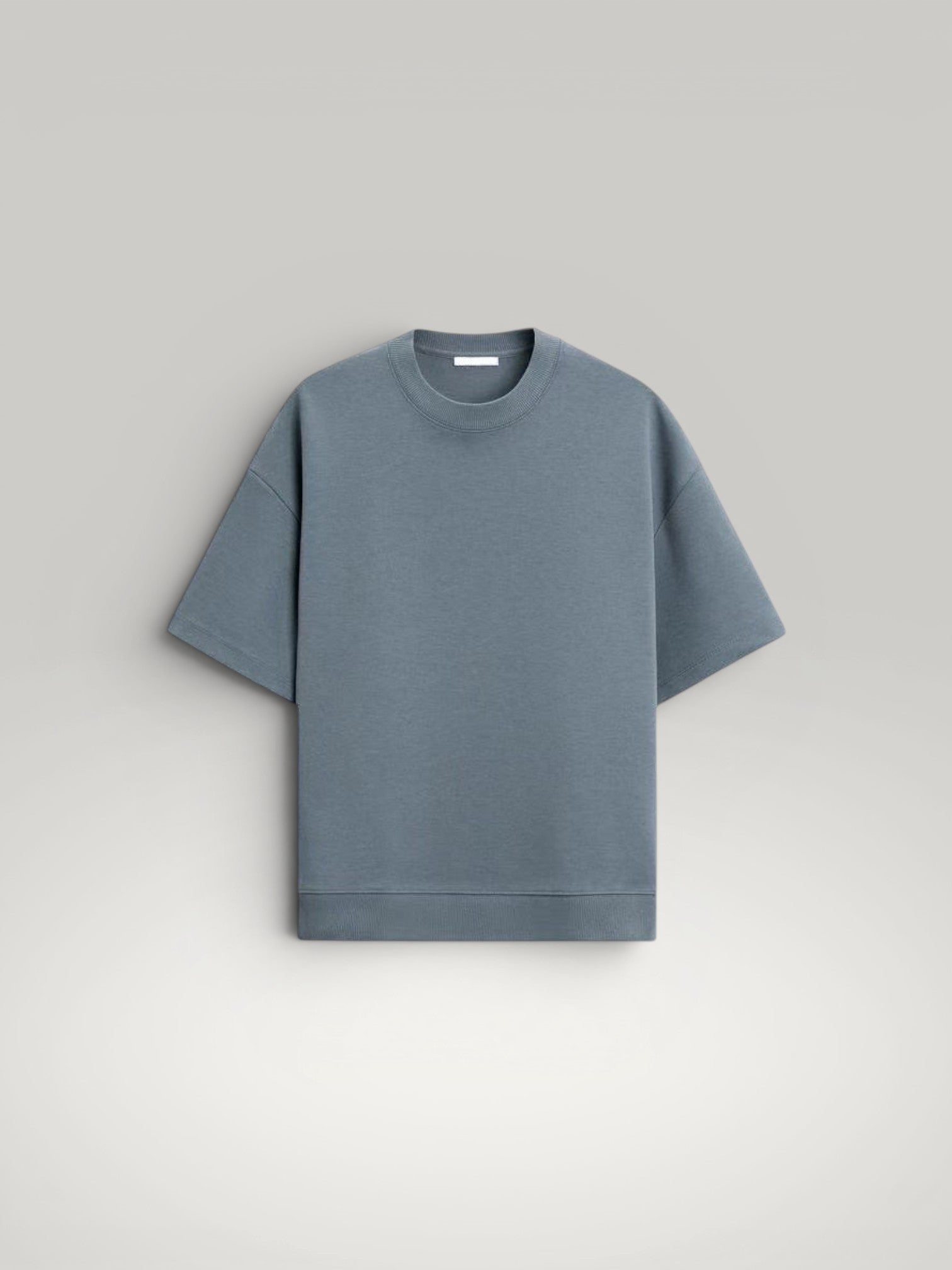 Urbain Couture blue oversized t-shirt with textured double-face fabric and wide short sleeves.