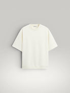 Urbain Couture cream oversized t-shirt with textured fabric and wide short sleeves. Minimalist summer style.
