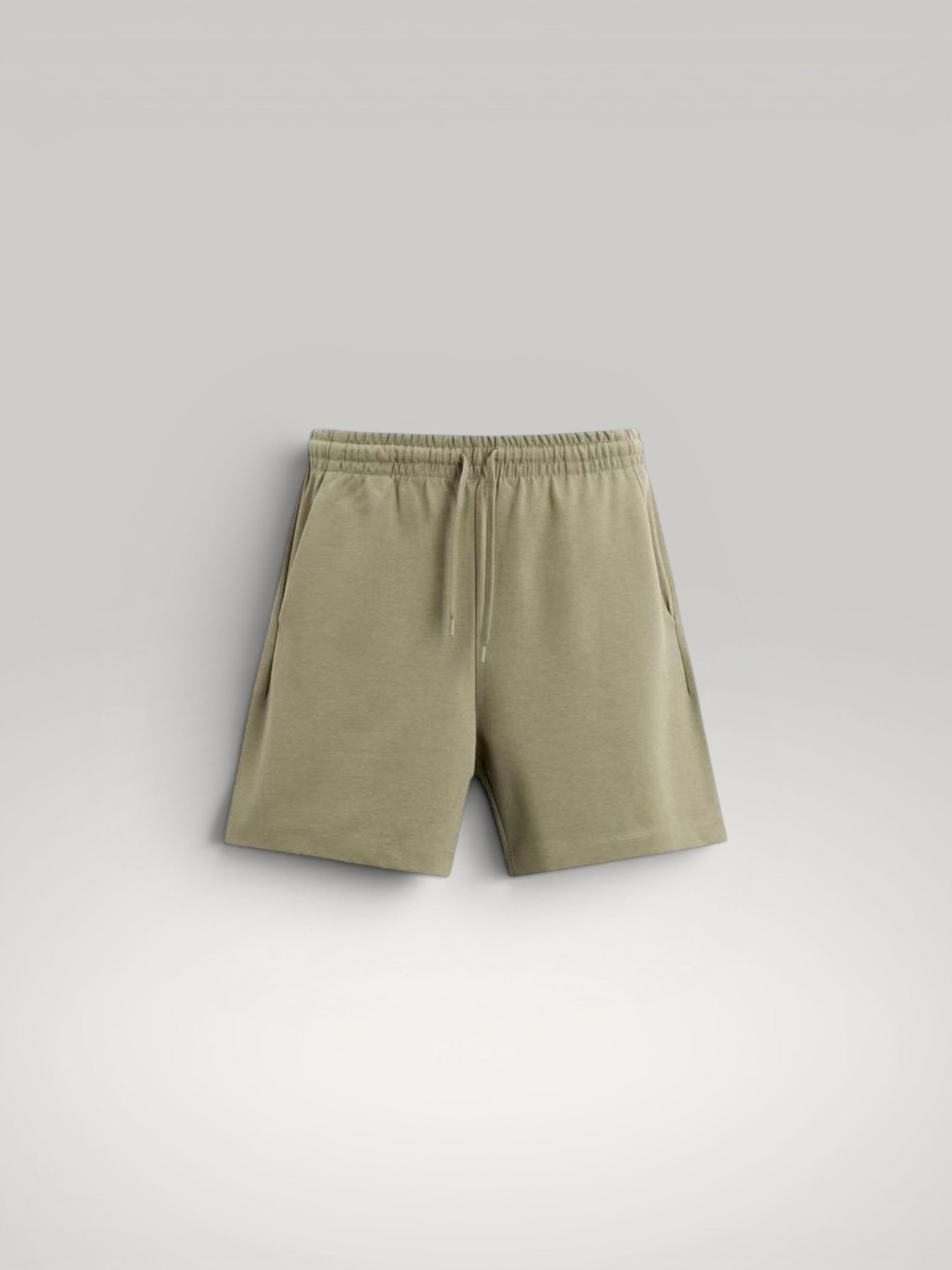 Urbain Couture olive green textured double-face cotton blend oversized shorts with drawstring waist.