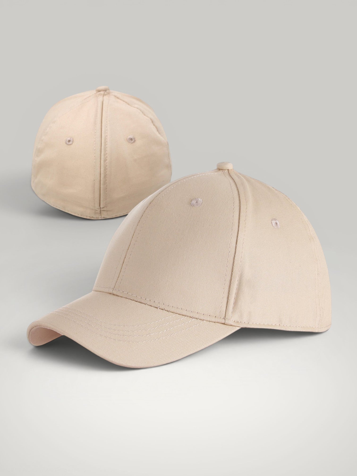 Urbain Couture beige katoenen paardenstaart pet met magnetische sluiting voor comfort en stijl.
